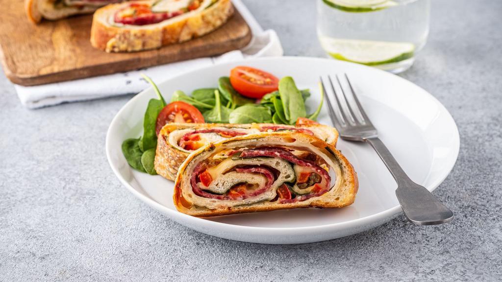Pepperoni Stromboli · Italian turnover made with Pizza Dough and filled with mozzarella cheese and topped with pepperoni slices.