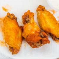 Buffalo Wings · Authentic buffalo, New York-style wings, large, juicy with a classic buffalo sauce.
