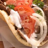 Double Meat Gyro · with lettuce, tomato, onion, sadzeke sauce on a warm pita bread