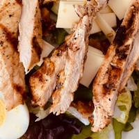 California Chicken Avocado Salad · With char-broiled chicken or chicken tenders and hard boiled egg served over large tossed sa...