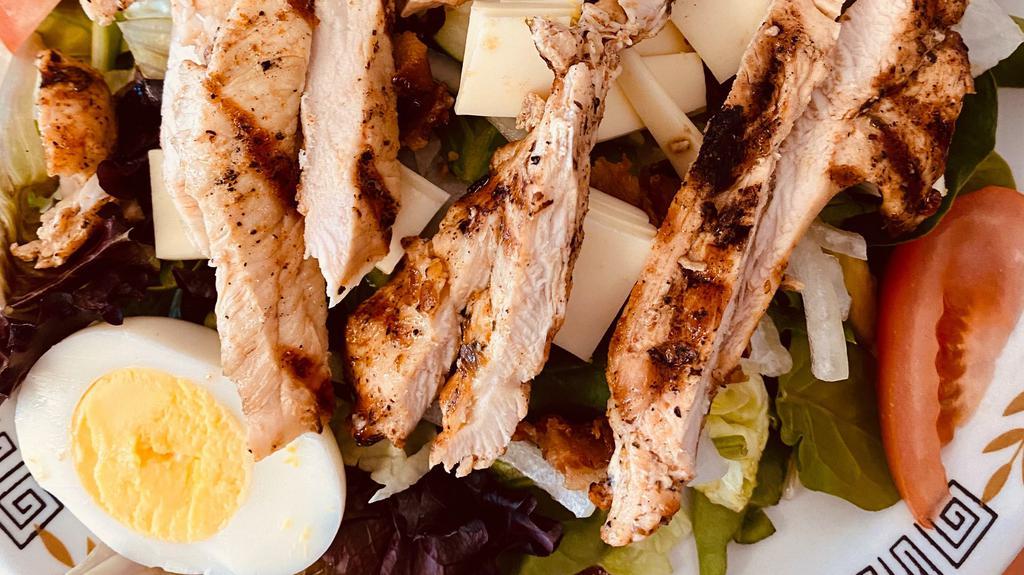 California Chicken Avocado Salad · With char-broiled chicken or chicken tenders and hard boiled egg served over large tossed salad.