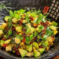 Poke Bowl · Rice bowl topped with choice of fish, edamame, avocado, sweet corn, and ikura. 
Served with ...