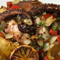 Octopus - Polvo Grelhado · Grilled portuguese octopus, peppers, onions.