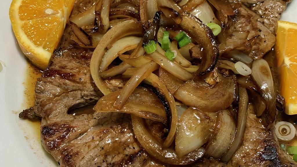 Steak With Onions - Bife Acebolado · Pan seared sirloin steak, grilled onions.