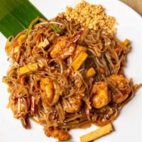 Pad Thai Noodles · Thai-style noodles with choice of vegetables or meat. Topped with crushed peanuts. Spicy.