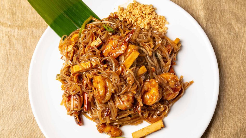 Pad Thai Noodles · Thai-style noodles with choice of vegetables or meat. Topped with crushed peanuts. Spicy.