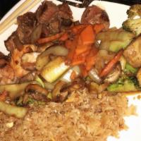 Vegetable Hibachi · Served with clear soup, green salad, two pieces of hibachi shrimp appetizer, mixed vegetable...
