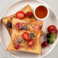 Blueberry French Toasts Platter · 2 fluffy blueberry french toasts with choice of meat, eggs and cheese!