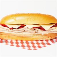 The Turkey Italian Sub · Sliced turkey, roasted red peppers, and mozzarella on a hoagie roll.