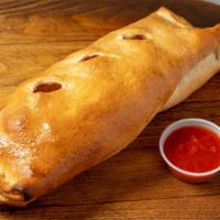 Fordham Stromboli (Xl) · Stromboli with savory sausage, mushroom, melted Parmesan and mozzarella, and a side of marin...