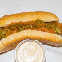 The Hot Hotdog · German Frank or Beef hot dog topped with Texas Hot sauce, jalapenos, onions and Redneck Must...