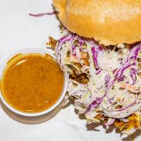 Carolina Pulled Pork Sandwich · Our multiple award winning hickory smoked pulled pork on a kaiser roll topped with coleslaw....