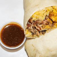 The Hog-Ritto · Our signature food truck favorite.  A generous amount of pulled pork is wrapped in a flour t...