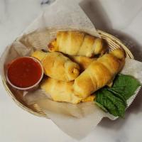 Pepperoni Puffs · Pepperoni, mozzarella twisted in our homemade dough. 3pc or 6pc options.