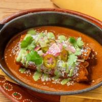 Beef Short Rib Enchiladas · chile pasilla sauce, crema, queso fresco & fresh jalapeno  Served with black beans & red rice.