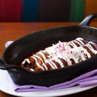 Black Bean Enchiladas · Salsa pipian, chihuahua cheese, crema, mushrooms
& pickled red onion.  Served with black bea...