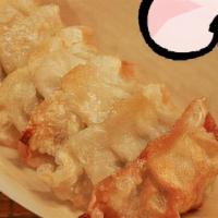 (A) Shrimp Gyoza 6 Pcs · Fried Japanese-style dumplings filled with shrimp, cabbage, onion. Side of Sweet chili sauce