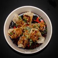 D8 Sweet And Spicy Jiaozi · Steamed dumplings with homemade spicy and sweet sauce with choice of protein