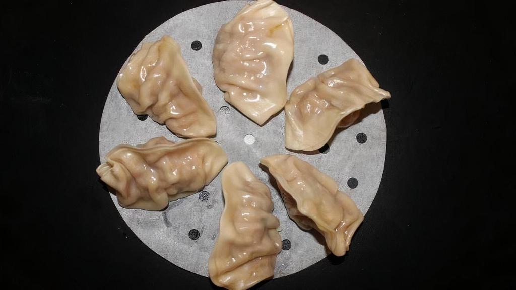 D10 Boiled Jiaozi · Boiled dumplings filled with choice of protein