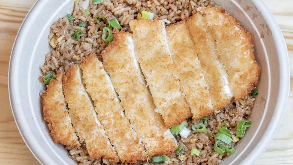 F4 Fried Chicken Over Soy Fried Rice · One piece chicken white meat in panko bread over soy garlic fried rice