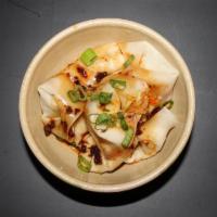 V2 Sweet And Spicy Veggie Wonton · Steamed wontons in a homemade spicy and sweet sauce