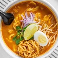 Khao Soy Noodle Soup · Spicy. Northern Thai-style egg noodle with bean sprouts, onion, scallion, cilantro, lime cru...
