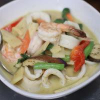 Green Curry · Spicy. Eggplant, string bean, bell pepper, bamboo shoots, basil, and coconut milk. Served wi...