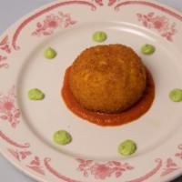 Arancina · Rice Ball with Saffron, Beef Ragù, Peas, and Tomato Sauce.