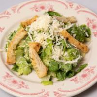 Insalata Caesar · Toasted bread, lettuce, parmesan with anchovies capers garlic dressing