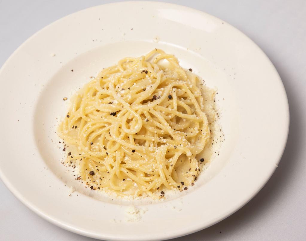 Cacio E Pepe · Homemade Spaghetti, Pecorino Cheese, and Crushed Black Pepper.