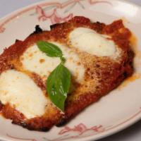 Pollo Alla Parmigiana · Organic Fried Chicken Breast with Mozzarella and Homemade Tomato Sauce.