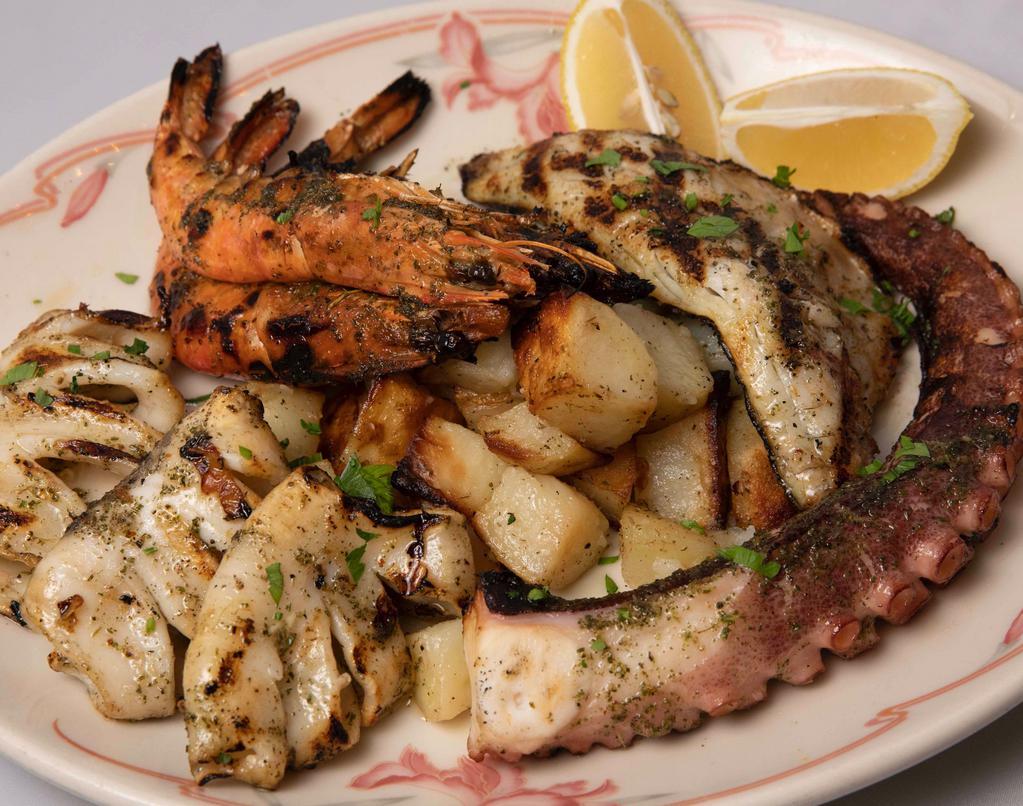 Grigliata Di Pesce · Grilled Fish Platter, Jumbo Shrimps, Calamari, Octopus, Branzino, and Roasted Potatoes.