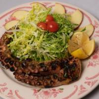 Polpo Alla Griglia · Grilled Octopus with Frisée Salad, Fresh Apples, and Apple Vinegar Dressing.