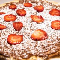 Nutella Pizza · Pizza with Nutella and fresh strawberries