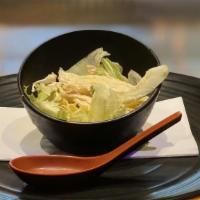 House Salad · Green salad with ginger dressing.