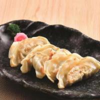 Gyoza (Shrimp Or Pork) · Japanese style pan fried dumpling.