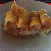 Mango Girl · Snow crab, shrimp, lobster and asparagus wrapped by paper thin mango with Sweet and chili fr...