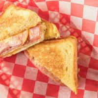 Cousin Jimmy Egg Sandwich · Two fried eggs, thin sliced pork roll, and cheese, served on Texas toast.