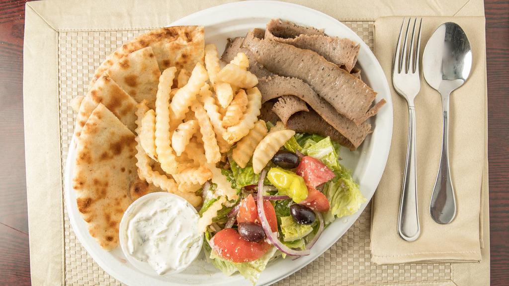 Gyro Platter · Original or chicken gyro. Served with greek salad, pita bread & choice of french fries or rice.