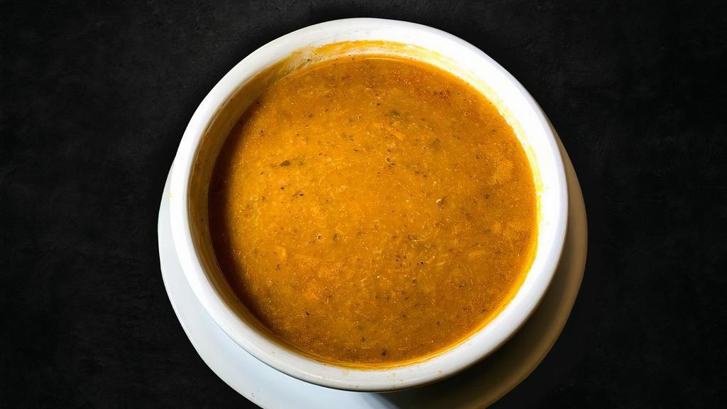 Red Lentil Soup · Red lentil, finely chopped onions, tomato paste, olive oil and dried crushed mint leaves.