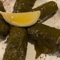 Stuffed Grape Leaves (5 Pcs.) · Vine grape leaves stuffed with rice, herbs, lemon juice and pine nuts.
* Contains nuts.