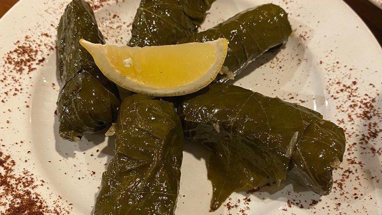 Stuffed Grape Leaves (5 Pcs.) · Vine grape leaves stuffed with rice, herbs, lemon juice and pine nuts.
* Contains nuts.