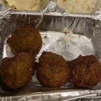 Falafel (5)  · Chickpeas blended with special herbs and seasonings.