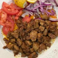 Beef Liver · Sautéed beef liver and special seasoning served with onions, tomatoes and lemon.