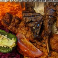 Adana Kebab · Ground Lamb blends with special seasoning mix created by the chef.