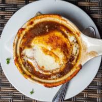 French Onion Soup · Toasted Baguette, Mozzarella Cheese, Au Gratin