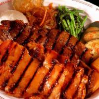 Kalbi & Bbq Chicken Plate · It comes with bbq short ribs, chicken, fried man doo and zucchini. Served with two scoops of...