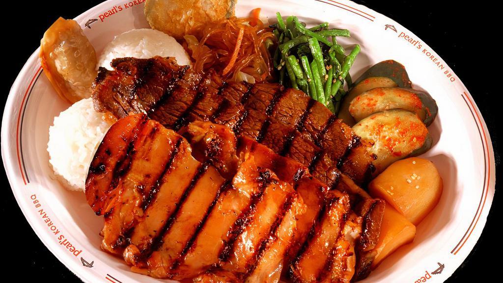 Kalbi & Bbq Chicken Plate · It comes with bbq short ribs, chicken, fried man doo and zucchini. Served with two scoops of rice.