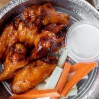Jumbo Hot Wings · Served with celery and blue cheese.