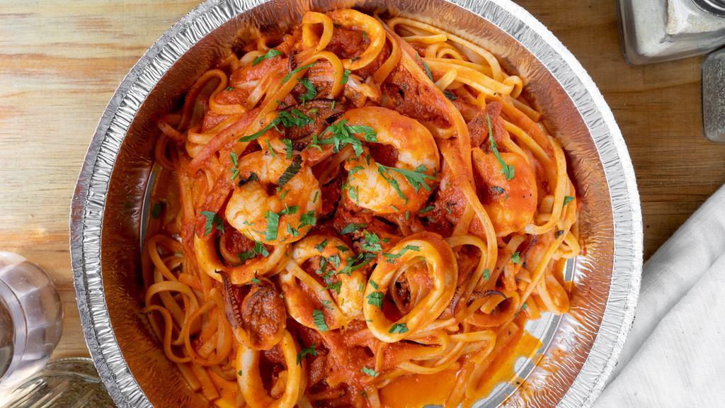 Pasta Pescatore · Shrimp, clams, calamari and sauteed in marinara sauce. Served with choice of pasta.